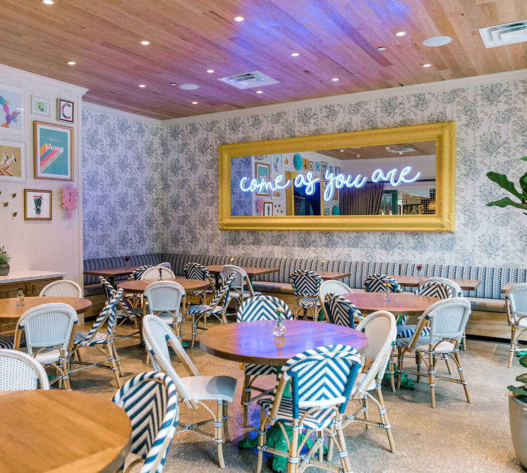 Group dining at Flower Child in Dallas